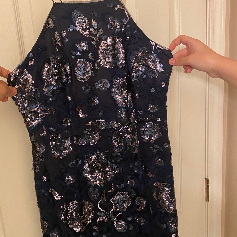 Adrianna Papell used beaded navy gown